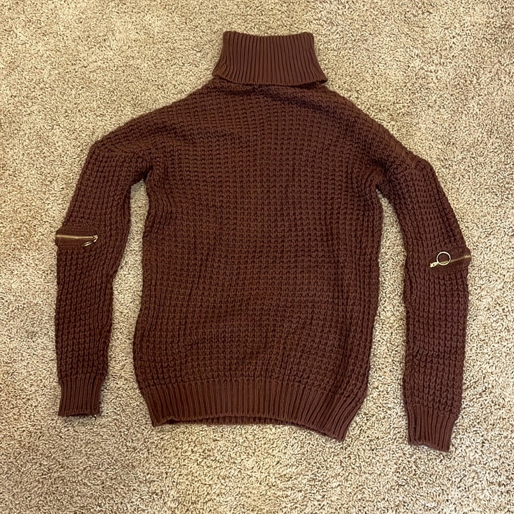 BRAND NEW, without tags, never been worn. Guess sweater.